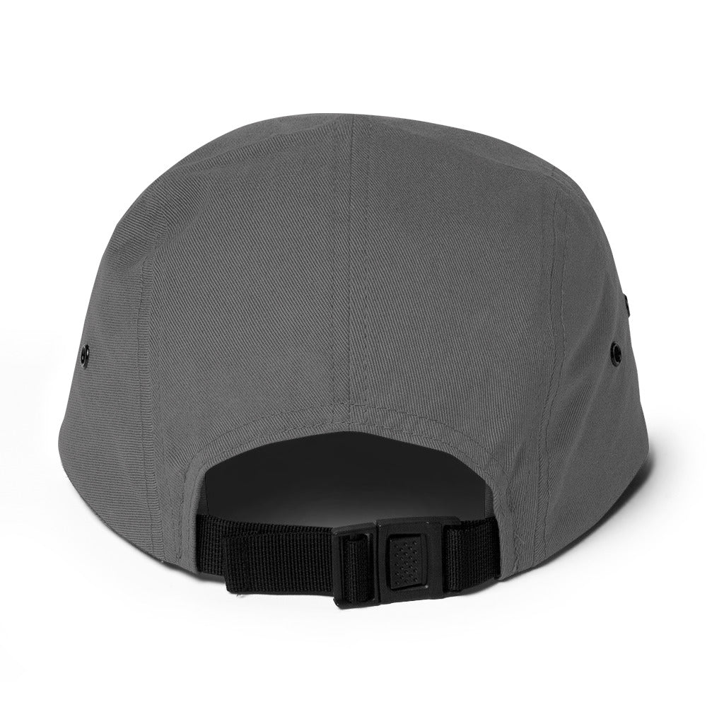 Back view of grey 5-panel cap with black adjustable strap and metal eyelets