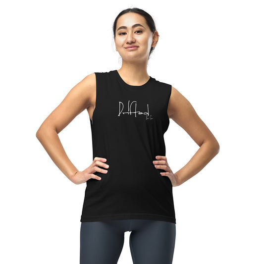 Woman wearing black sleeveless tank top with white Drifted logo on front, posing with hands on hips