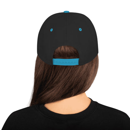 Back view of person wearing black snapback hat with teal adjustable strap and eyelets