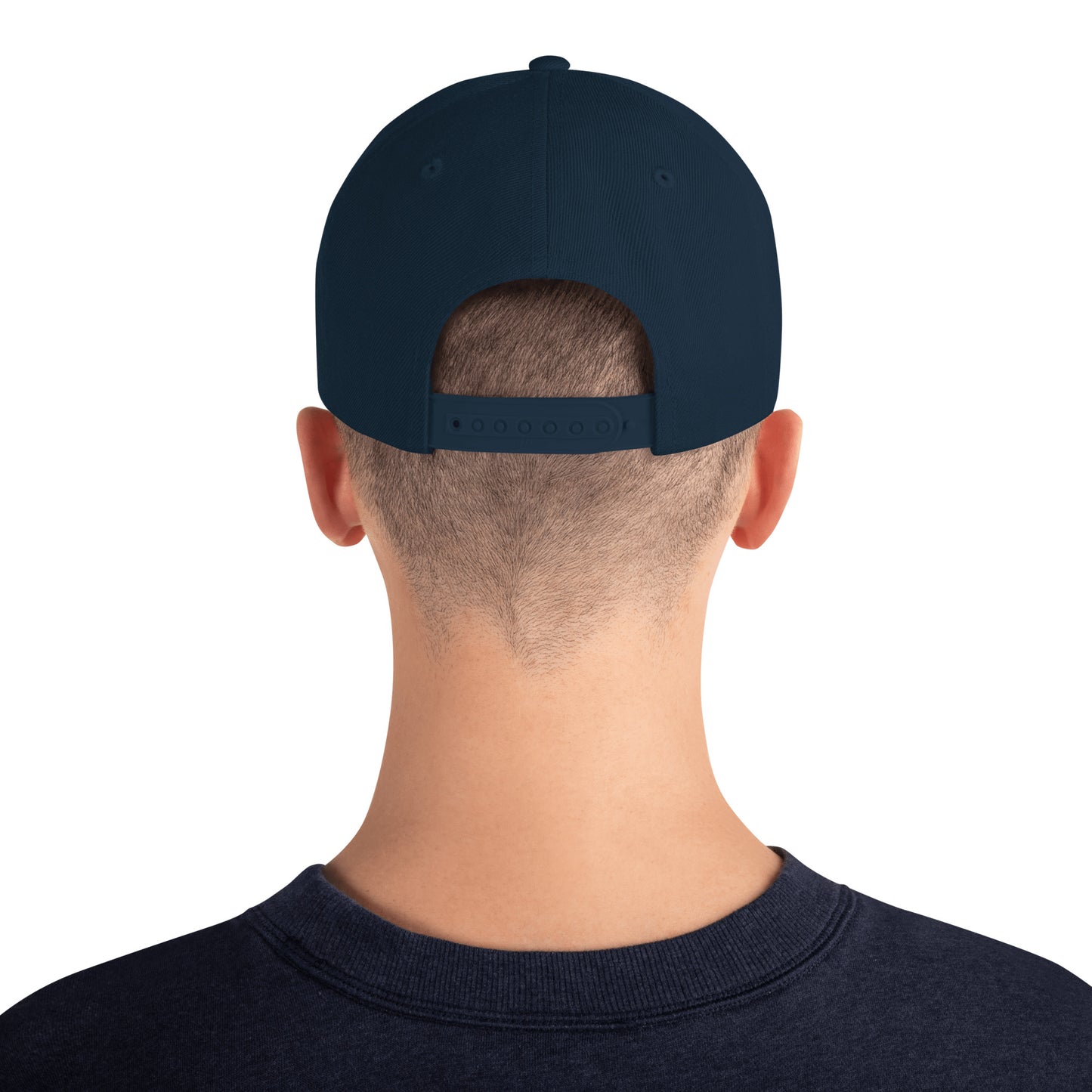 Back view of person wearing dark navy classic snapback cap with adjustable strap and navy sweatshirt