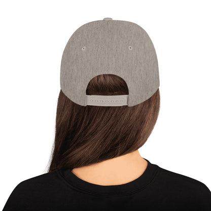 Back view of a person wearing a classic heather grey snapback cap with adjustable strap and long brown hair