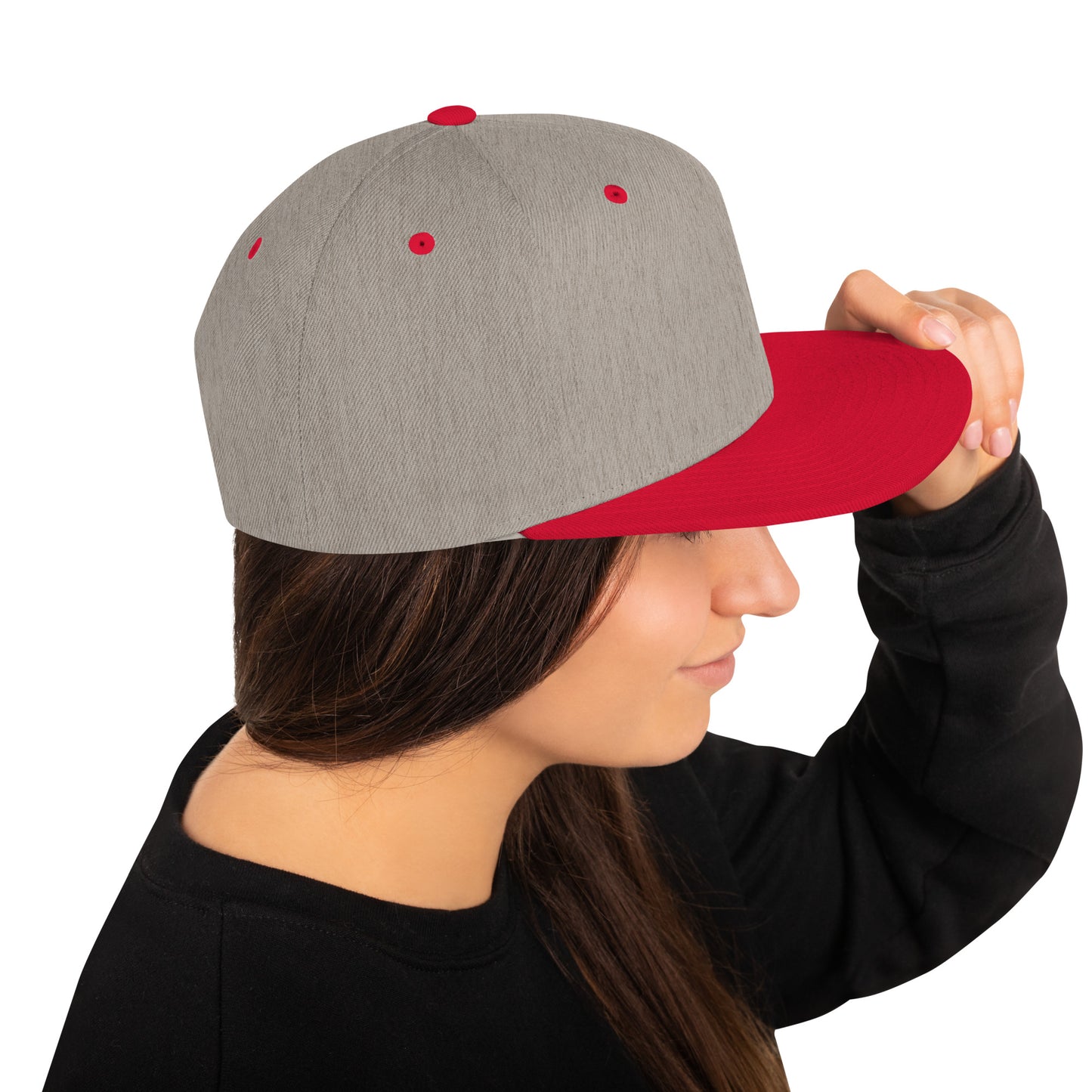 Heather grey snapback cap with red brim and accents worn by woman in black shirt