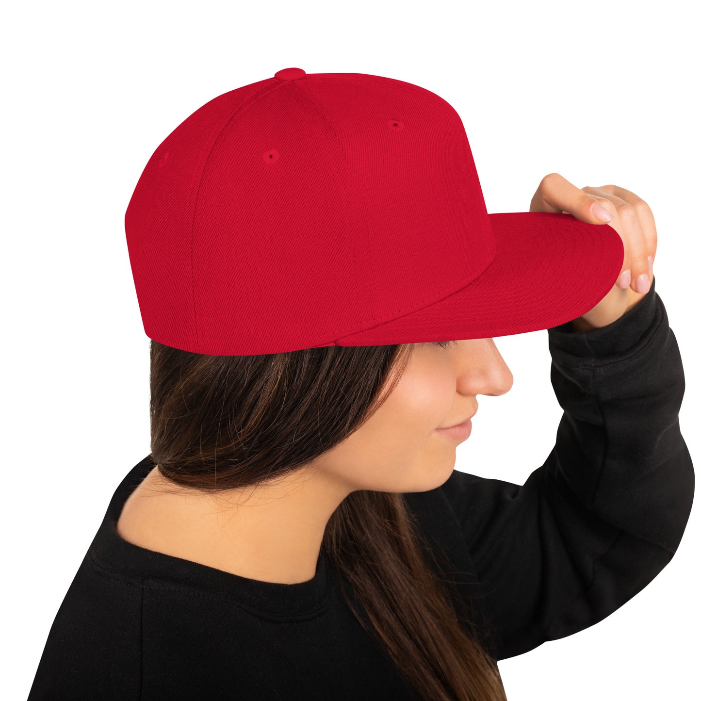 Side view of a woman wearing a plain red classic snapback cap with a flat brim