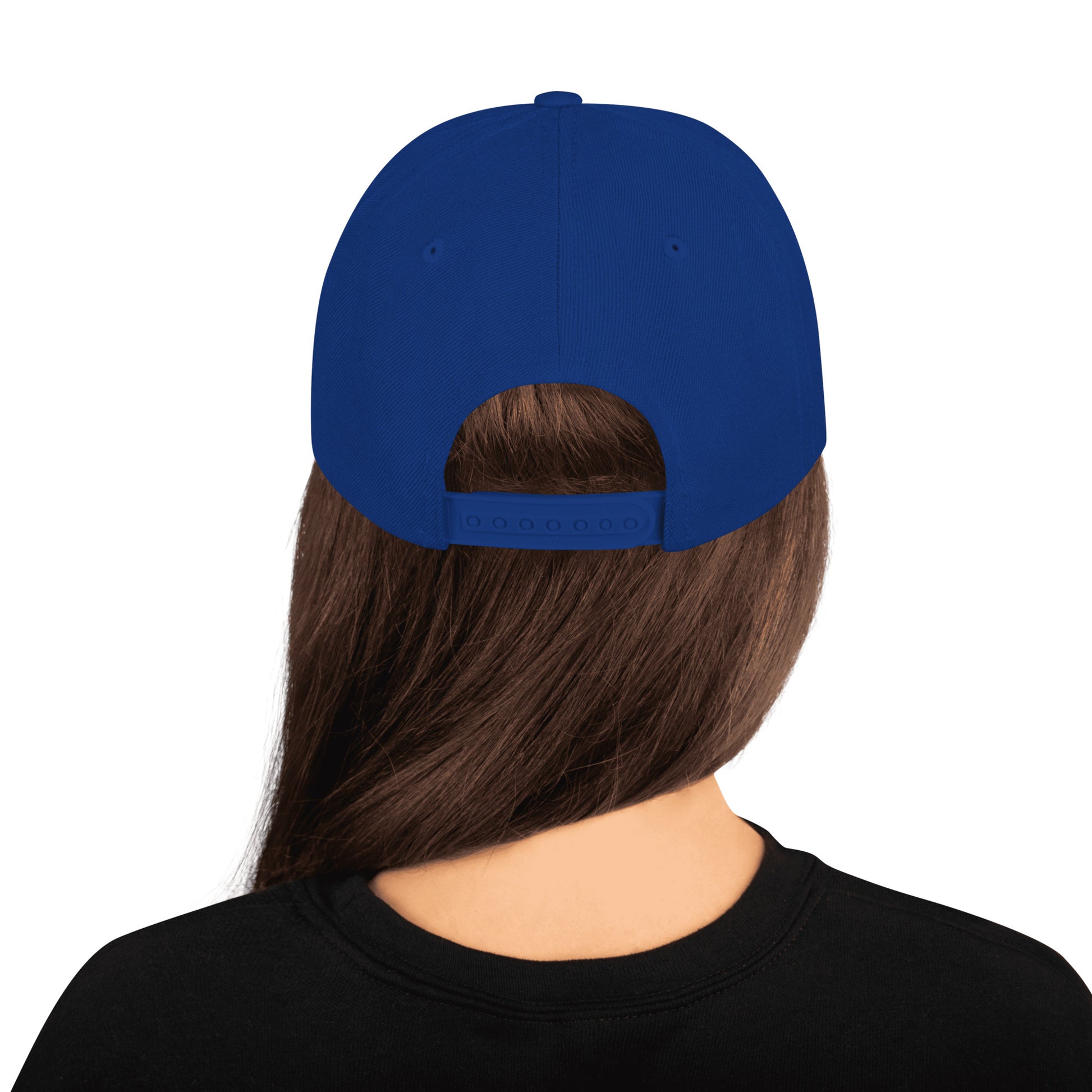 Back view of person wearing royal blue classic snapback cap with adjustable strap and long brown hair