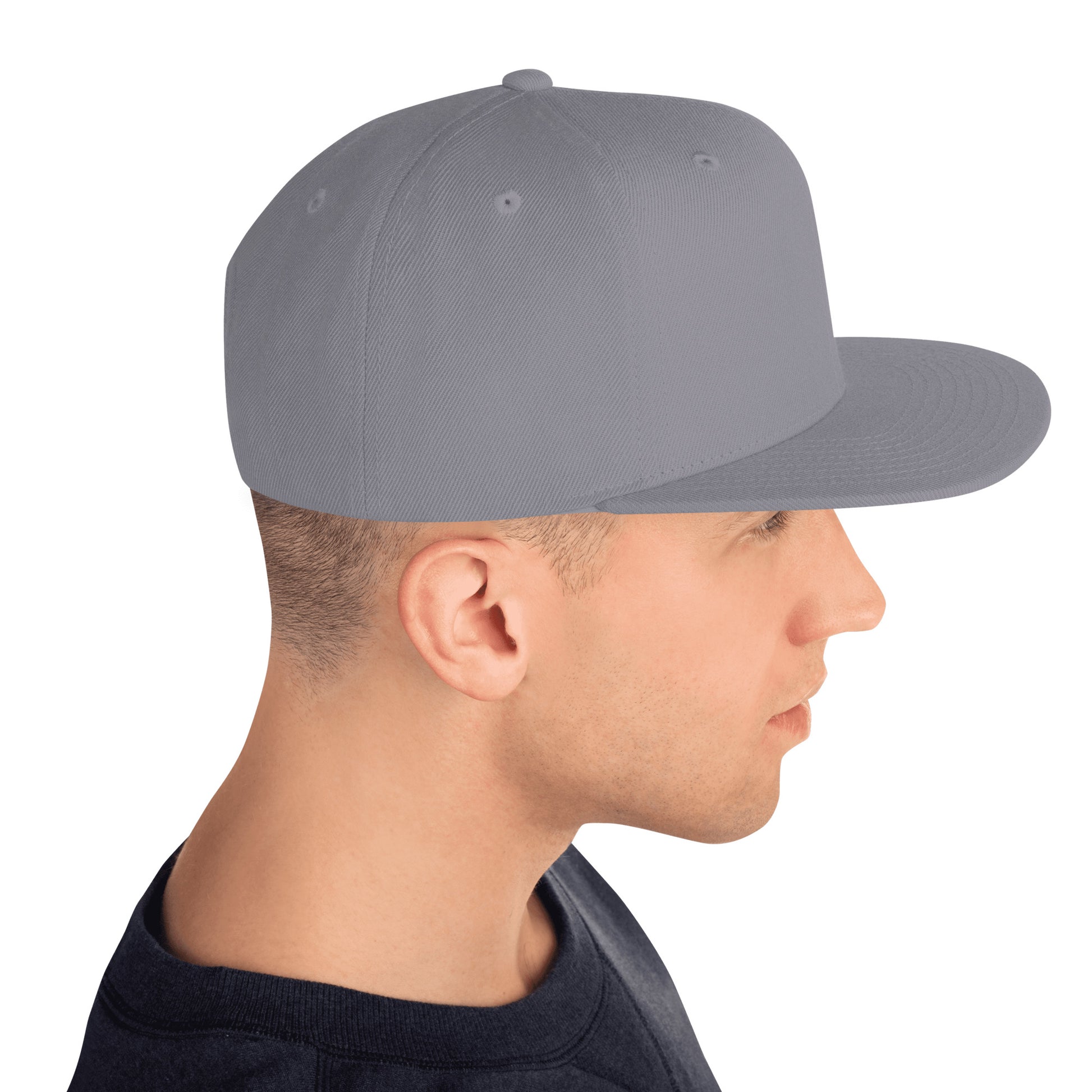 Profile of man wearing classic silver snapback cap with flat brim on white background