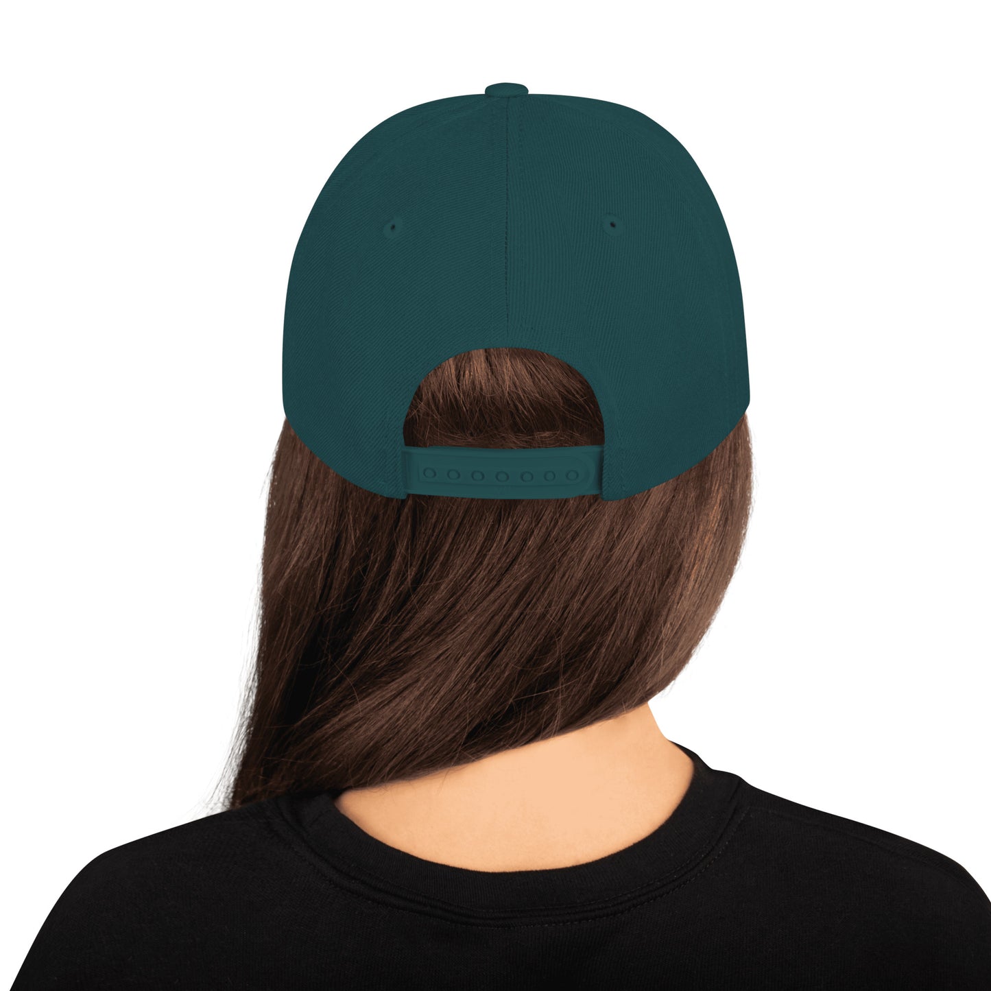Back view of person wearing classic spruce green snapback hat with adjustable strap and brown hair