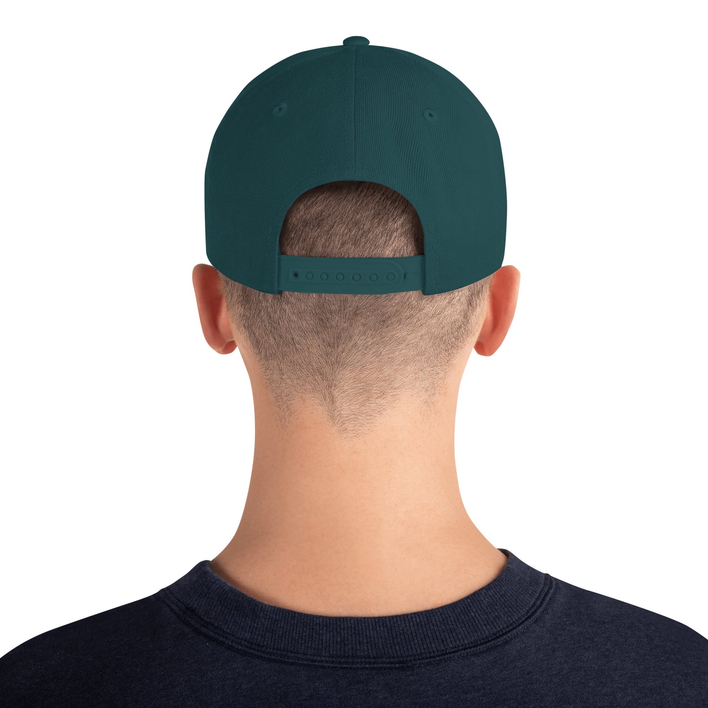 Rear view of person wearing adjustable classic snapback hat in spruce green with navy sweatshirt