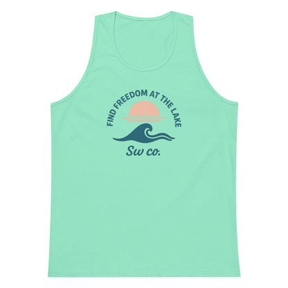 Men's premium mint green tank top with sunset and wave logo and text Find Freedom at the Lake