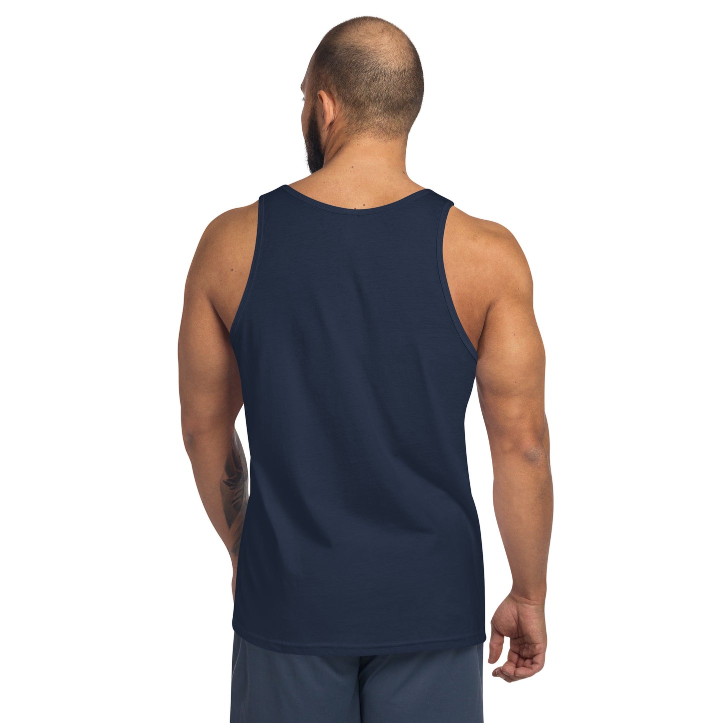 Back view of man wearing navy blue men's staple tank top and grey shorts