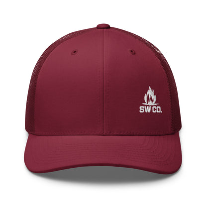 Cranberry red retro trucker hat with white embroidered SW CO. logo and mesh back