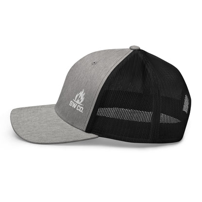 Retro trucker hat with grey front panel logo and black mesh back, flat brim cap side view