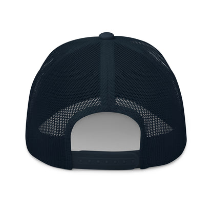 Back view of navy blue mesh retro trucker hat with adjustable snap closure