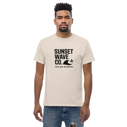 Man wearing natural color Sunset Wave Co. graphic tee with wave and fire design