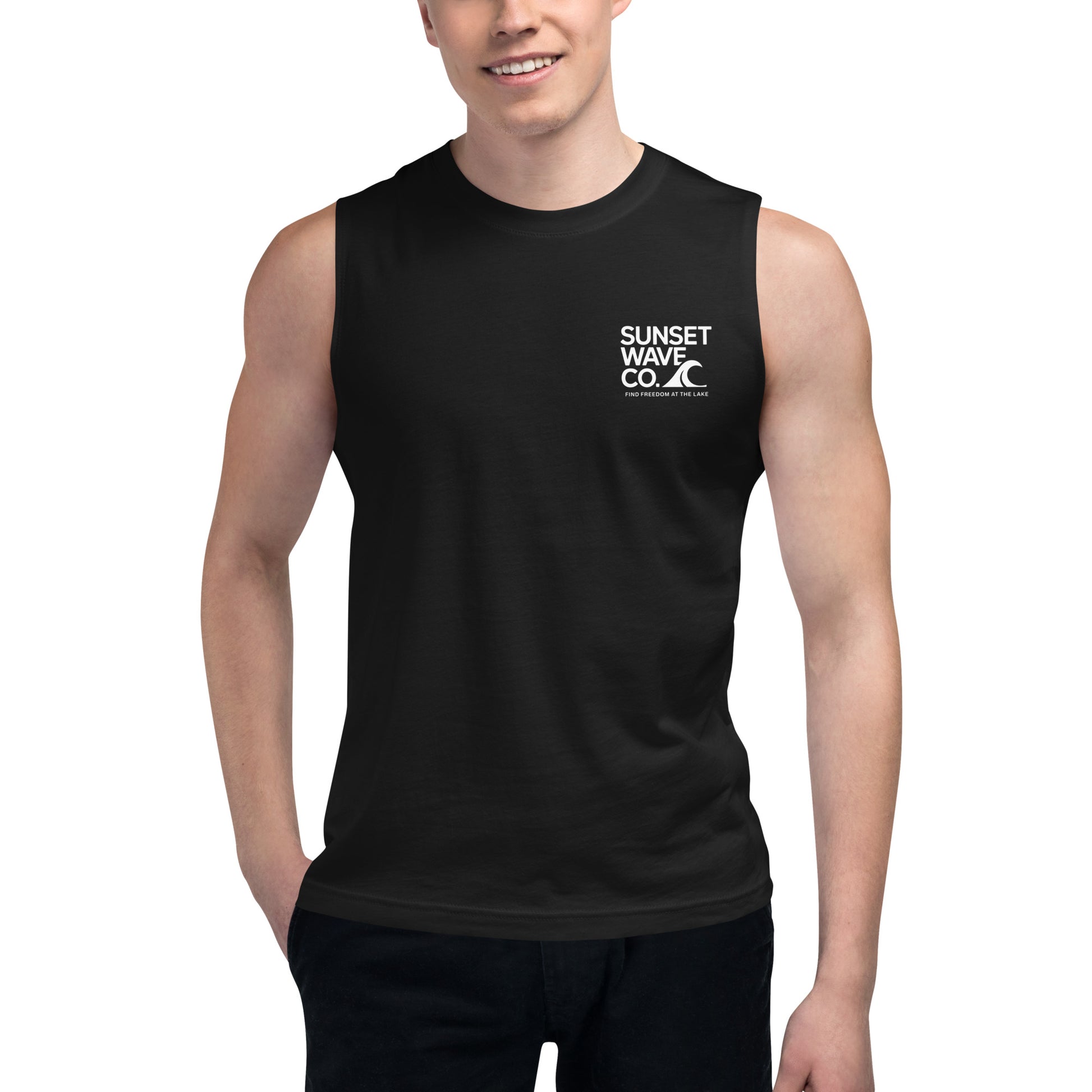 Man wearing black unisex muscle shirt with white Sunset Wave Co. logo on front
