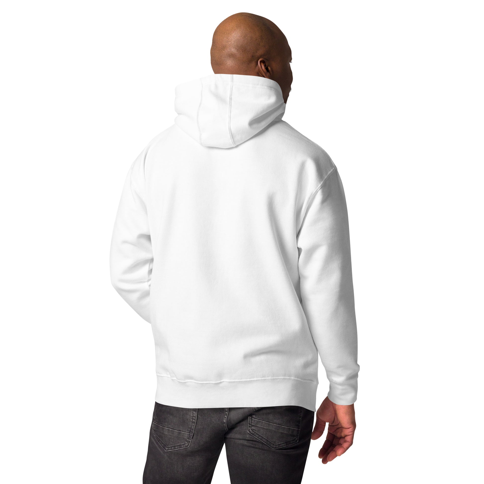 Back view of a man wearing a plain white unisex premium hoodie and dark jeans
