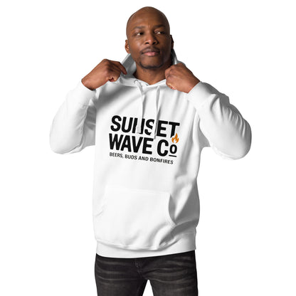 Man wearing white unisex premium hoodie with Sunset Wave Co graphic and flame icon