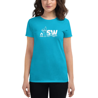 Woman wearing Caribbean blue fitted t-shirt with white surf and campfire graphic design