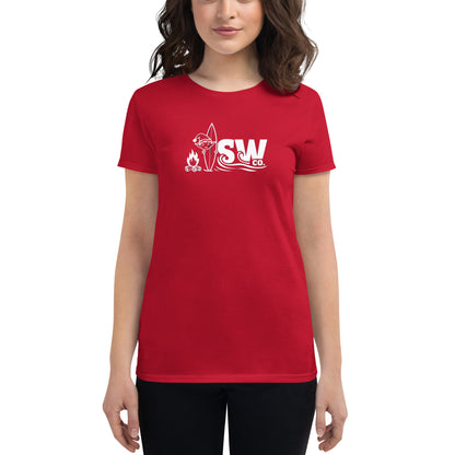 Woman wearing true red fitted t-shirt with white SW co. surfing and campfire logo